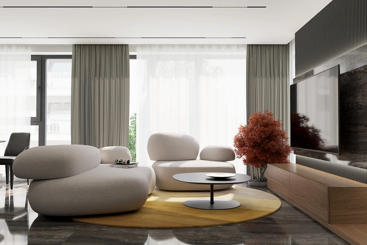 Luxusný dizajn interiéru bytu v Žiline s moderným nábytkom, dizajnovou sedačkou oblých tvarov a elegantným kontrastom farieb.