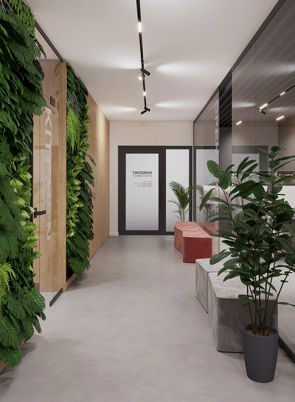 Chodbový priestor, navrh interiéru kancelárie s vertikálnou zelenou stenou, sedením a sklenenými priečkami.